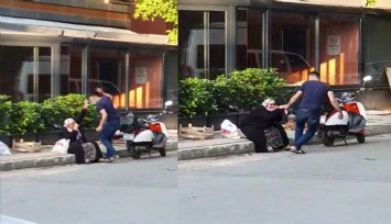 Silahlı saldırgan sokak ortasında annesini darp etti