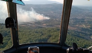 İzmir'de ziraat arazisinde çıkan yangın kontrol altında  
