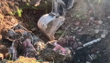 Kuşadası'nda esrarengiz olay: Toprağa gömülü aracın gizemi