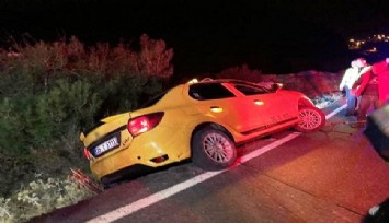 İzmir’de yürekleri ağza getiren olay: Ticari taksi bankette asılı kaldı, 3 kişilik aileyi itfaiye kurtardı