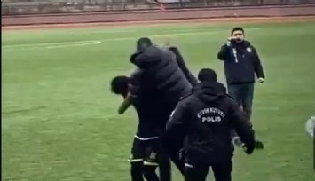 Sahaya inen kulüp başkanı rakip futbolcuyu tokatladı