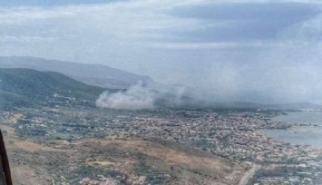 İzmir'de yerleşim yerlerine yakın ağaçlık alanda yangın
