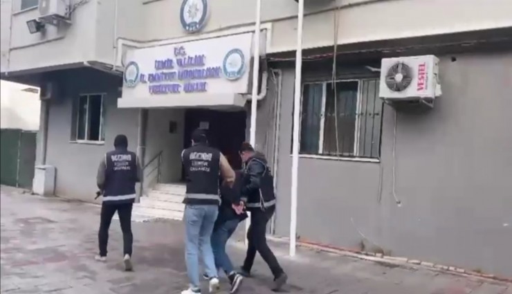 interpol tarafından kırmızı bültenle aranan şahıs İzmir'de yakalandı
