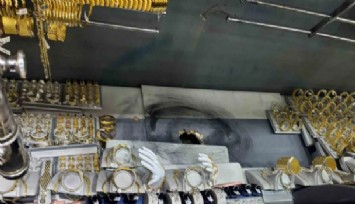 Bodrum katından duvar delerek girdiği kuyumcudan 10 kilogram altın çaldı