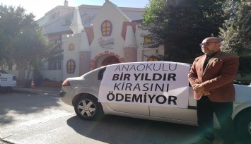 Kirasını ödemeyen anaokuluna ilginç pankart