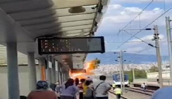 İZBAN İstasyonu'nda korkutan olay: Ağaç  elektrik tellerine devrildi, ağaç yandı