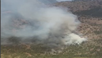 Kemalpaşa'da orman yangını:  4 uçak, 2 helikopter müdahale ediyor