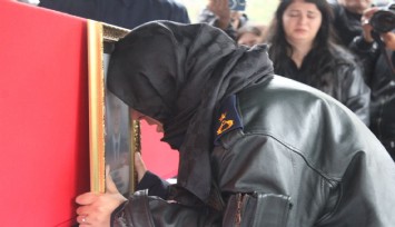 Şehit eşini askeri montuyla son yolculuğuna uğurladı