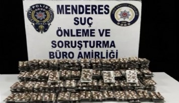 Menderes’te ikamete operasyon: Bahçeden binlerce uyuşturucu hap çıktı
