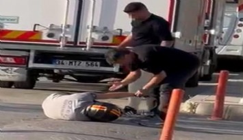 İzmir trafiğinde şiddet: Motosikletli yere düştü, defalarca tekmelendi