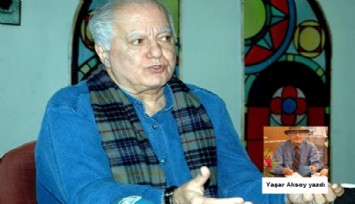 Yan masada oturan Erotik Filmler Yönetmeni Ülkü Erakalın..