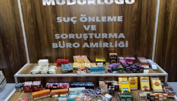 İzmir'de tekel bayisine kaçak sigara ve ilaç operasyonu