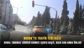Konak’ta trafik tehlikesi: Kural tanımaz sürücü kırmızı ışıkta geçti, kaza son anda önledi
