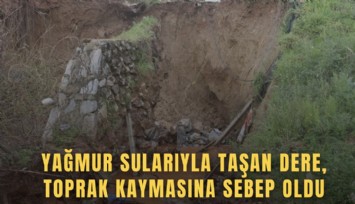 Yağmur sularıyla taşan dere, toprak kaymasına sebep oldu