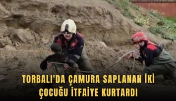 Torbalı'da çamura saplanan iki çocuğu itfaiye kurtardı