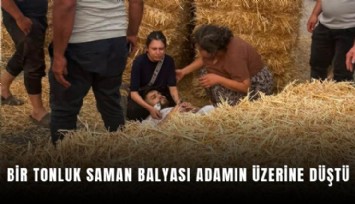 Bir tonluk saman balyası adamın üzerine düştü
