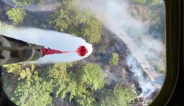 Ula'da yol kenarında çıkan yangın büyümeden söndürüldü